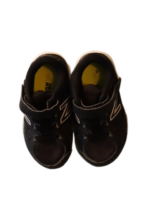 A Black Sneakers from New Balance in size 3T for boy. (Front View)