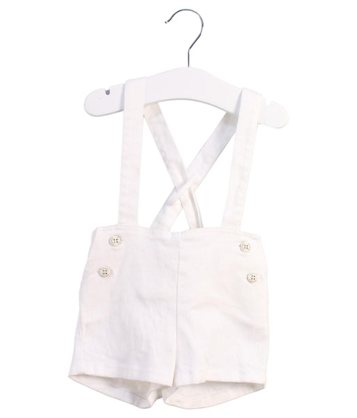 A White Overall Shorts from Nanos in size 6-12M for girl. (Front View)