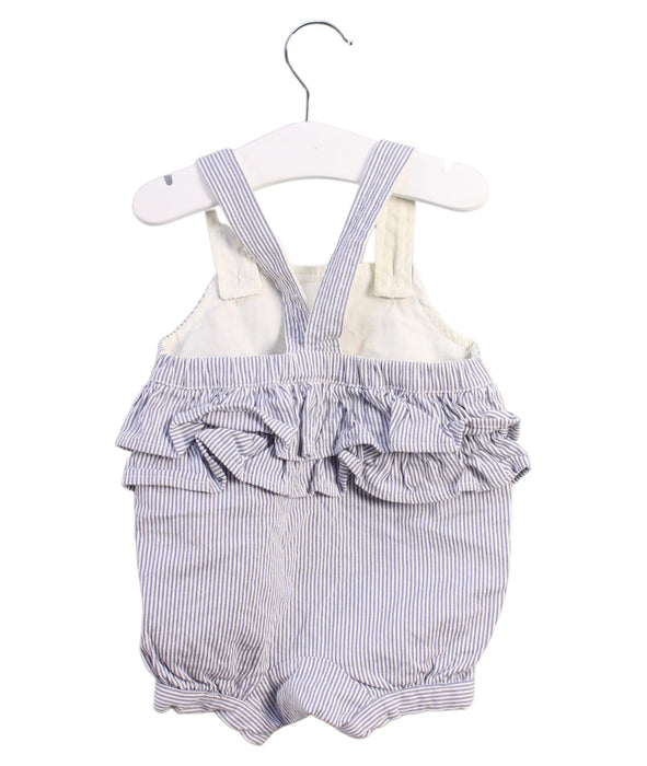 A White Overall Shorts from Petit Main in size 6-12M for girl. (Back View)