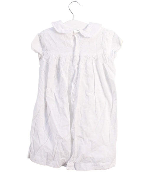 A White Short Sleeve Dresses from Smock London in size 4T for girl. (Front View)