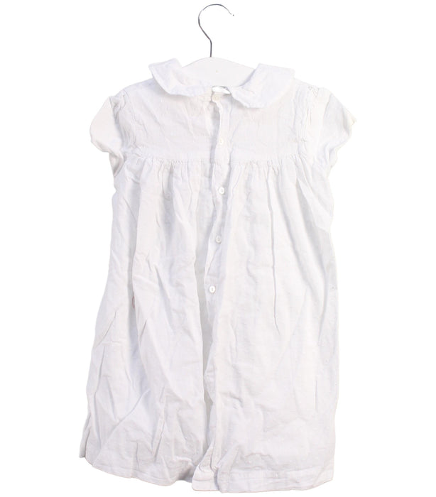 A White Short Sleeve Dresses from Smock London in size 4T for girl. (Front View)