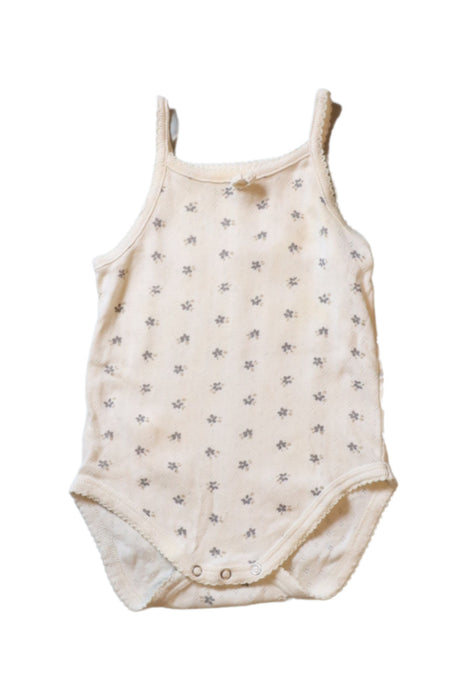 A Ivory Sleeveless Bodysuits from Quincy Mae in size 6-12M for girl. (Front View)