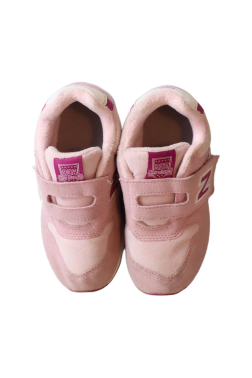 A Pink Sneakers from New Balance in size 4T for girl. (Front View)