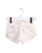 A White Shorts from Jamie Kay in size 2T for girl. (Front View)
