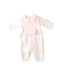 A White Long Sleeve Jumpsuits from Chickeeduck in size 0-3M for girl. (Front View)