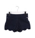 A Navy Shorts from Jacadi in size 5T for girl. (Front View)