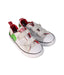 A White Sneakers from Converse in size 4T for boy. (Front View)