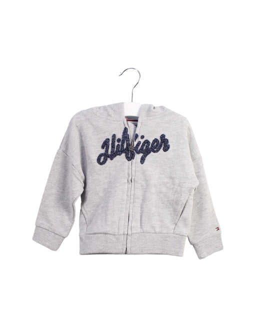 A Grey Zippered Sweatshirts from Tommy Hilfiger in size 6-12M for girl. (Front View)