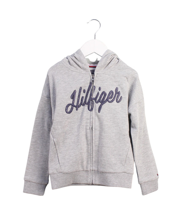 A Grey Zippered Sweatshirts from Tommy Hilfiger in size 5T for girl. (Front View)