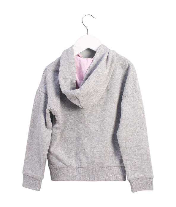 A Grey Zippered Sweatshirts from Tommy Hilfiger in size 5T for girl. (Back View)