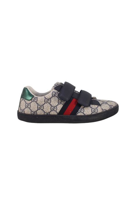 A Black Sneakers from Gucci in size 10Y for girl. (Back View)