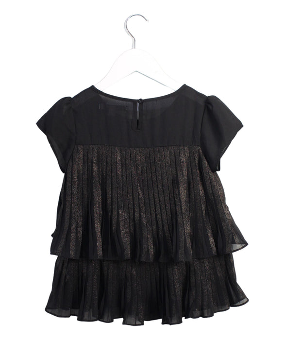 A Black Short Sleeve Tops from DKNY in size 6T for girl. (Back View)