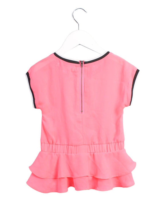 A Pink Short Sleeve Tops from DKNY in size 4T for girl. (Back View)