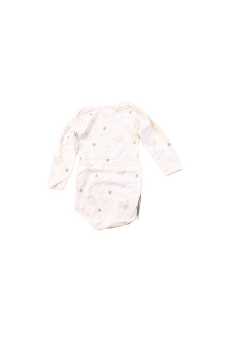 A Ivory Long Sleeve Bodysuits from Petit Bateau in size 12-18M for girl. (Back View)