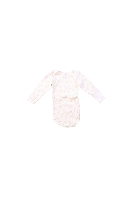 A White Long Sleeve Bodysuits from Petit Bateau in size 12-18M for girl. (Front View)