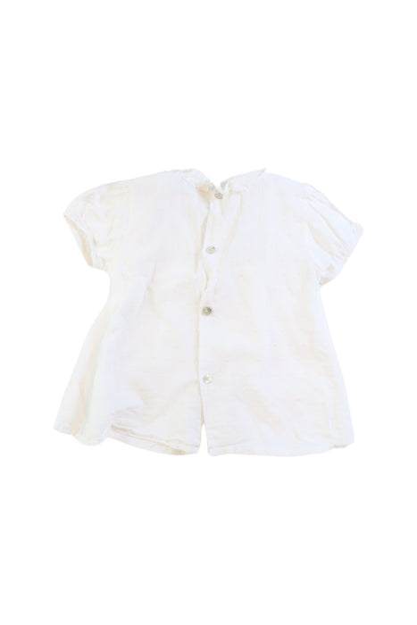 A White Short Sleeve Tops from Dona Carmen in size 3T for girl. (Back View)