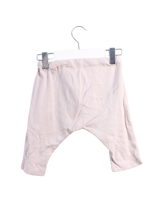 A White Leggings from COS in size 3-6M for girl. (Back View)