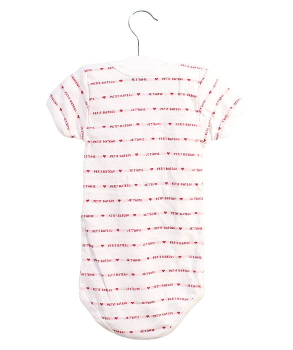 A Red Bodysuits from Petit Bateau in size 3T for neutral. (Back View)