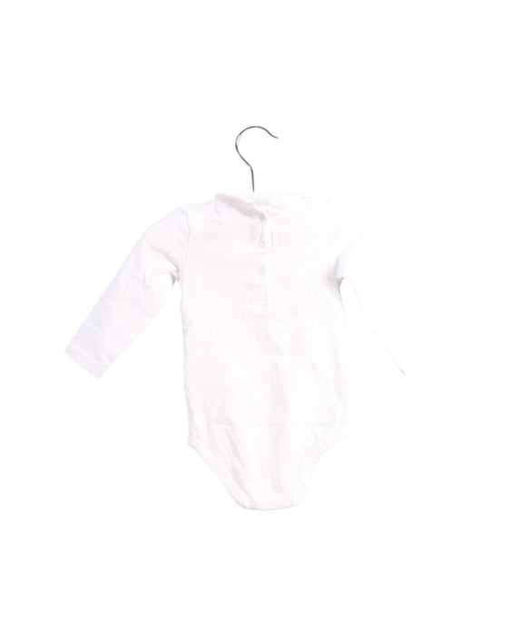 A White Bodysuits from Cyrillus in size 3-6M for neutral. (Back View)