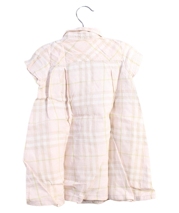 A White Short Sleeve Dresses from Burberry in size 6-12M for girl. (Back View)