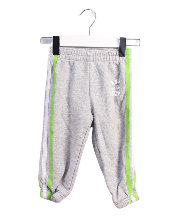 A Grey Sweatpants from Adidas in size 6-12M for boy. (Front View)