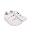 A White Sneakers from Puma in size 9Y for boy. (Front View)