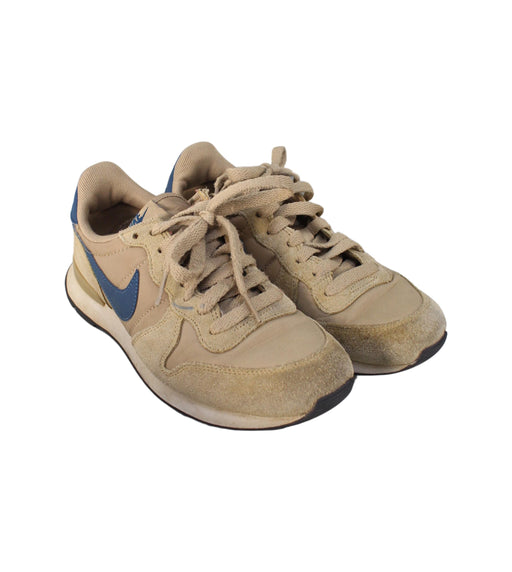 A Brown Sneakers from Nike in size 11Y for boy. (Front View)