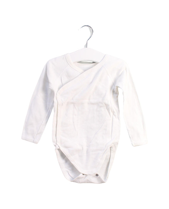 A White Bodysuits from Petit Bateau in size 6-12M for girl. (Front View)