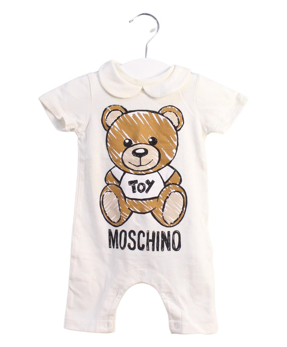 A White Jumpsuits from Moschino in size 0-3M for boy. (Front View)
