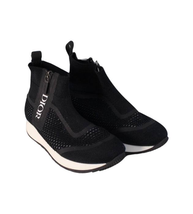 A Black Sneakers from Dior in size 5T for girl. (Front View)