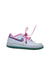 A White Sneakers from Nike in size 6T for girl. (Front View)