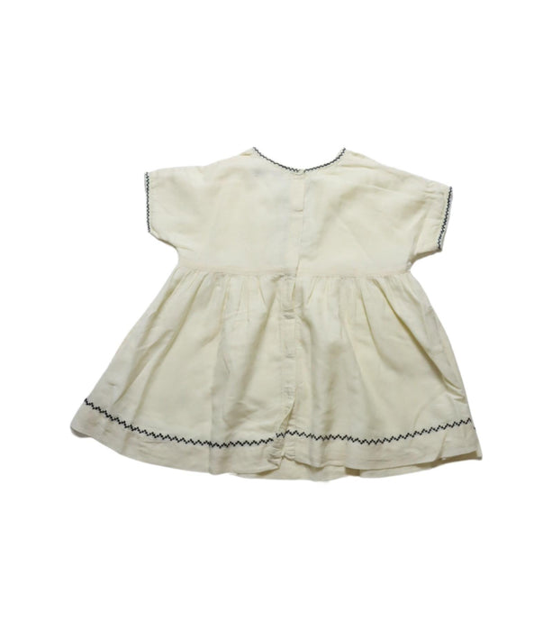 A Ivory Short Sleeve Dresses from Caramel Baby & Child in size 2T for girl. (Back View)