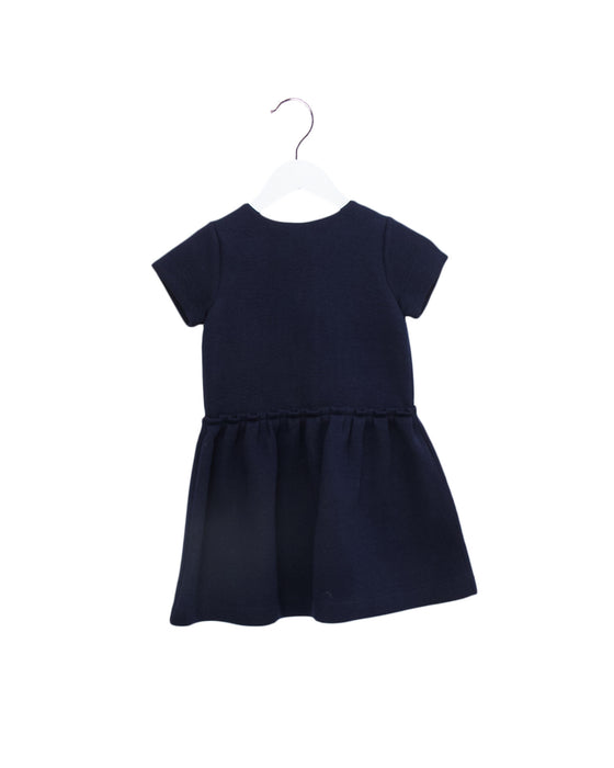 A Navy Short Sleeve Dresses from Jacadi in size 4T for girl. (Front View)