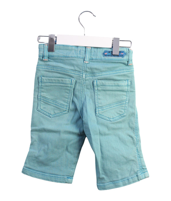 A Green Shorts from DPAM in size 4T for boy. (Back View)