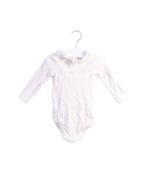 A White Bodysuits from Cyrillus in size 6-12M for girl. (Front View)