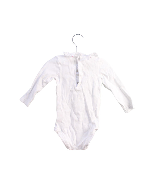 A White Bodysuits from Cyrillus in size 6-12M for girl. (Back View)