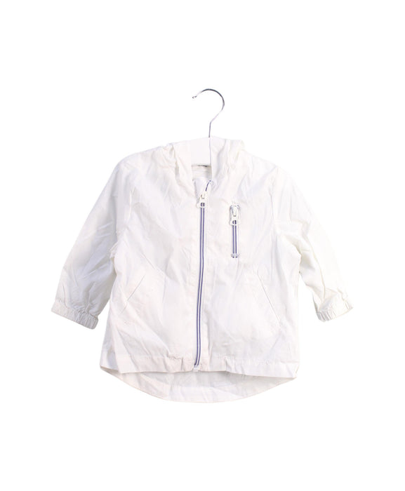 A White Lightweight Jackets from Bout'Chou in size 6-12M for girl. (Front View)