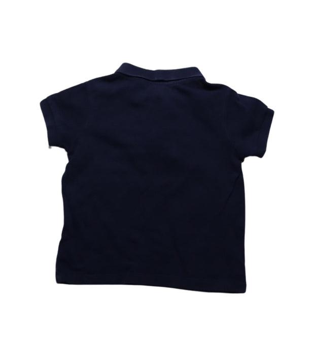 A Navy Short Sleeve Polos from Jacadi in size 4T for boy. (Back View)