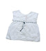 A White Sleeveless Tops from Bonpoint in size 4T for girl. (Front View)