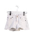 A White Shorts from Boden in size 4T for girl. (Front View)