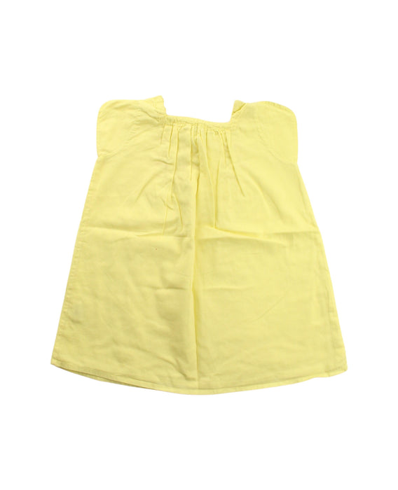 A Yellow Short Sleeve Dresses from Caramel in size 2T for girl. (Back View)