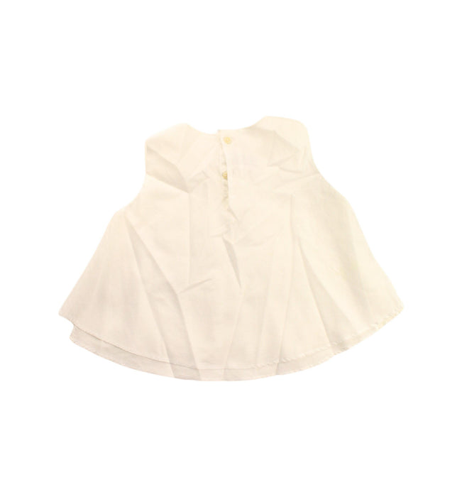 A White Sleeveless Dresses from Il Gufo in size 4T for girl. (Back View)