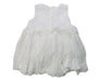 A White Sleeveless Dresses from Miniclasix in size 6-12M for girl. (Back View)