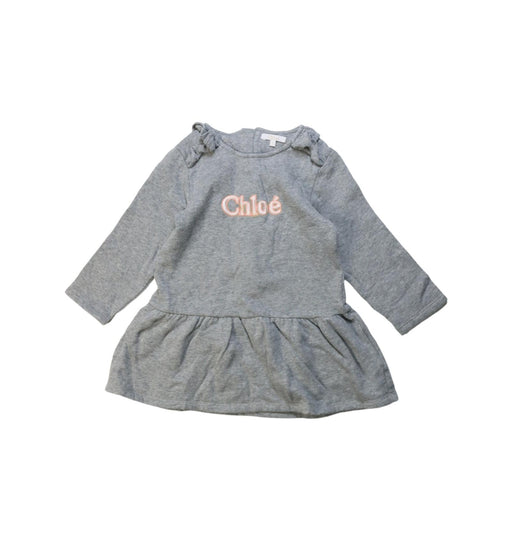 A Grey Long Sleeve Dresses from Chloe in size 4T for girl. (Front View)