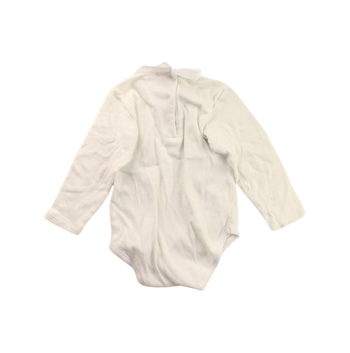 A White Long Sleeve Bodysuits from Bonpoint in size 2T for girl. (Back View)