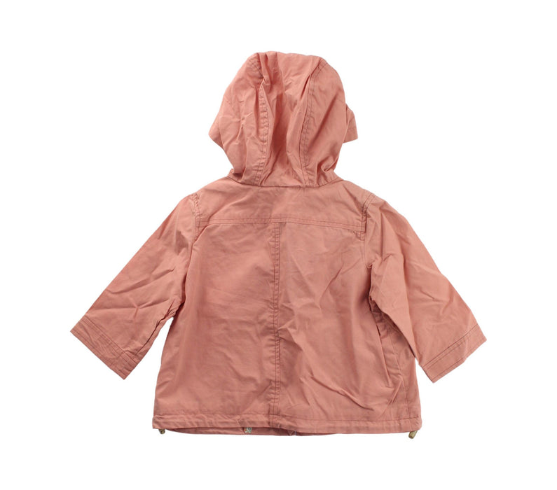 A Peach Lightweight Jackets from Bonpoint in size 6-12M for girl. (Back View)
