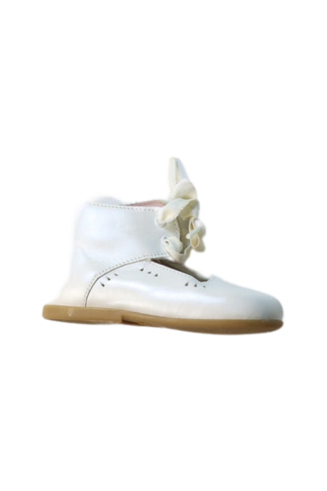 A White Flats from Jacadi in size 12-18M for girl. (Front View)