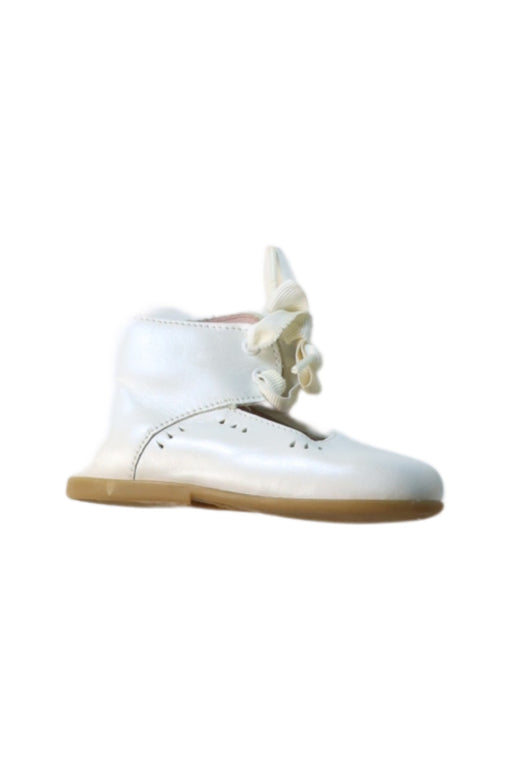 A White Flats from Jacadi in size 12-18M for girl. (Front View)