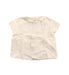A White Short Sleeve Shirts from Nanos in size 12-18M for girl. (Front View)