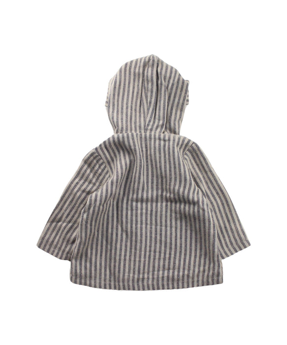 A Blue Lightweight Jackets from Happyology in size 6-12M for girl. (Back View)